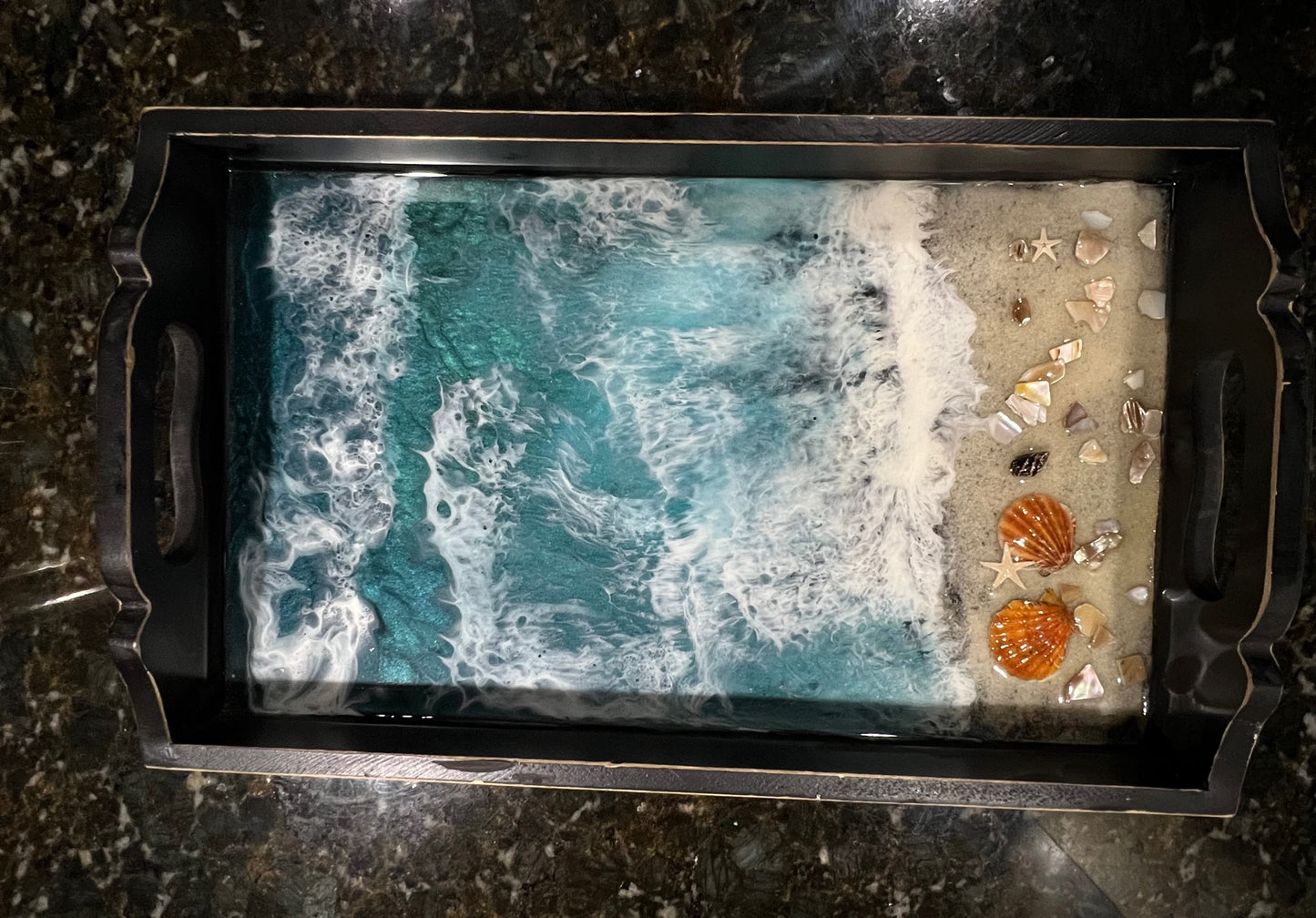 17.25" X 10.25" Black Charcuterie Tray embellished with sand and seashells.  